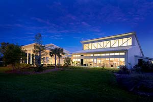 Photo of Exterior, Twin Lakes Park Office Complex at dusk.